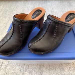 Clarks Black Leather Mules with Brown Accents